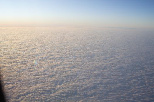 Wide cloud landscape aerial view from a plane.