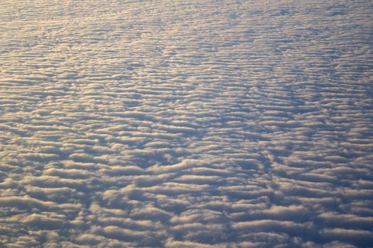 Wide cloud landscape aerial view from a plane.