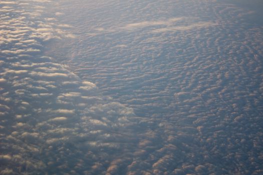 Wide cloud landscape aerial view from a plane.