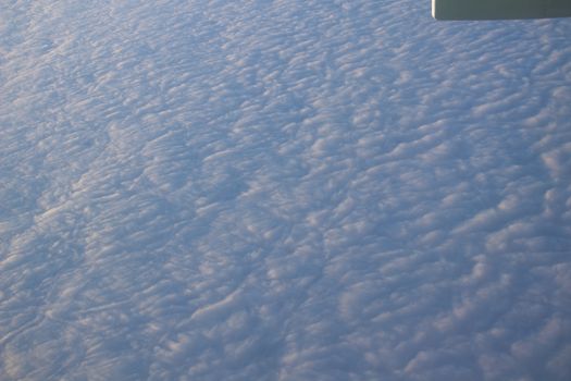 Wide cloud landscape aerial view from a plane.