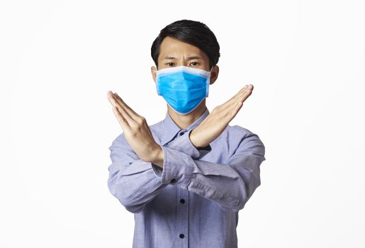 Asia man panic disorder wearing surgical mask covering mouth and nose. epidemic corona virus protection.