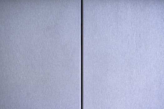Aluminium steel brushed sliding door of the closed lift and texture