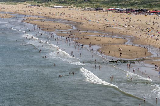 Aerial view of the Scheveningen beach during the hot summer season