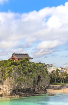 Shinto Shrine Naminoue at the top of a cliff overlooking the beach and ocean of Naha in Okinawa Prefecture, Japan.