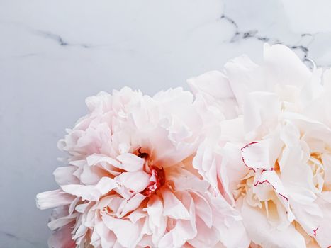 Bouquet of peony flowers on luxury marble background, wedding flatlay and event branding design