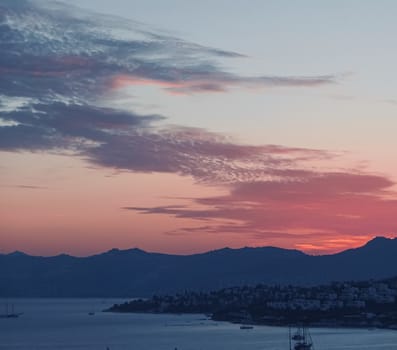 Beautiful sea view and mountains in the Mediterranean at sunset, summer vacation travel and holiday destination