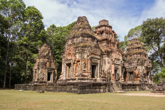 View of the ancient Khmer temple of Preah Ko, dedicated to the sacred bull. Part of the Roluos complex at Angkor, Cambodia.