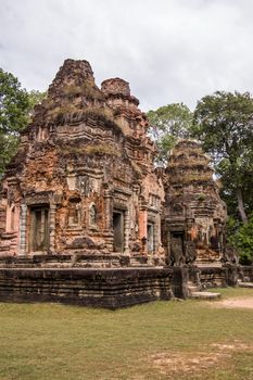The Ancient Khmer temple of Preah Ko, part of the Roluos complex in Angkor, Siem Reap, Cambodia. This temple of the Sacred Bull was dedicated to Shiva.