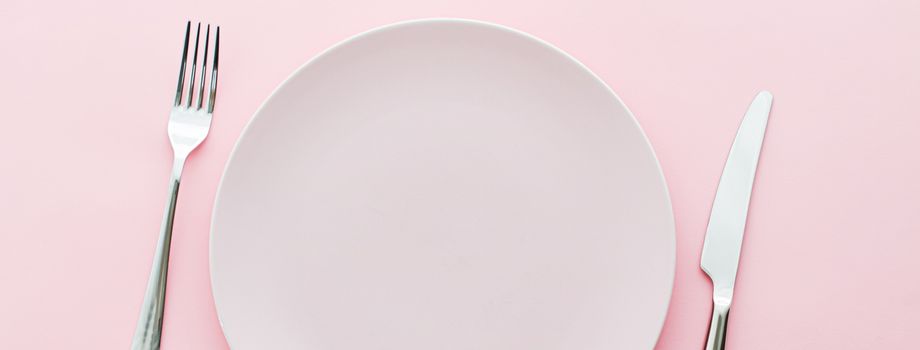 Empty plate and cutlery as mockup set on pink background, top tableware for chef table decor and menu branding design