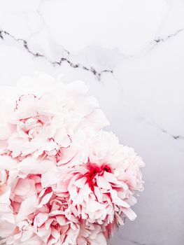 Bouquet of peony flowers on luxury marble background, wedding flatlay and event branding design