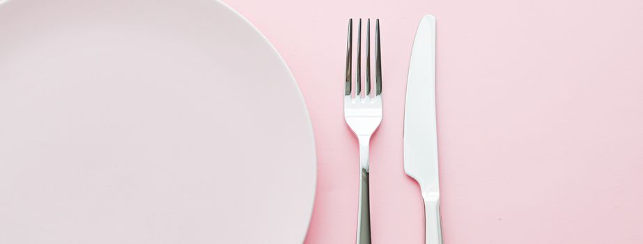 Empty plate and cutlery as mockup set on pink background, top tableware for chef table decor and menu branding design