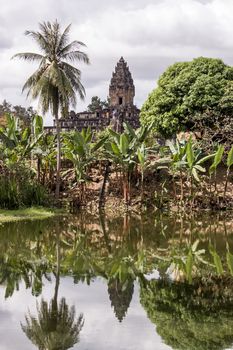 View across the moat towards the ancient Khmer Bakong Temple, Angkor, Cambodia. Temple mountain of the city of Hariharalaya.