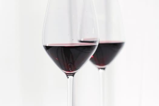 Two crystal glasses of red wine, organic beverage product