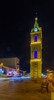 Tel-Aviv, Israel - September 19, 2019: Night view of the Clock tower in the old city of Jaffa, with Locals and visitors. Now part of Tel-Aviv-Yafo, Israel