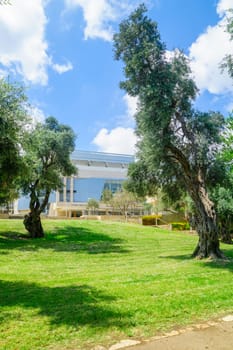 HAIFA, ISRAEL - AUGUST 18, 2016: View of Binyamin Garden, and the Haifa Theater building, with locals and visitors, in Hadar HaCarmel district, Haifa, Israel