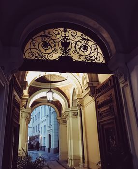 Exterior facade of classic building in the European city at night, architecture and design detail