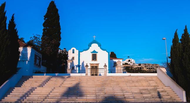 Albufeira, Portugal - May 3, 2018: Architectural detail of the Ermida Church of Our Lady of Orada (Nossa Senhora da Orada) on a spring day
