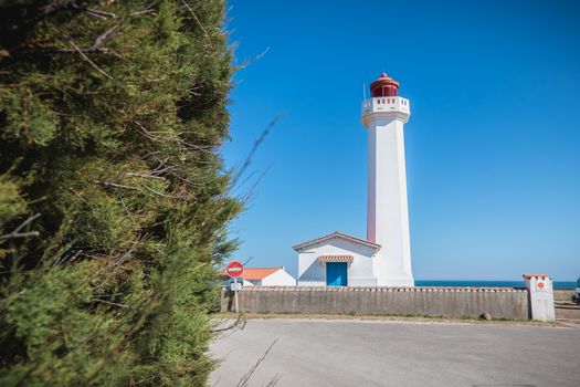 Port Joinville, France - September 17, 2018 - Architectural detail of the Corbeaux Marine Lighthouse on a summer day