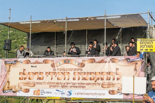 MERON, ISRAEL - MAY 03, 2018: Musicians play traditional songs for the dancing crowd, at the annual hillula of Rabbi Shimon Bar Yochai, in Meron, Israel, on Lag BaOmer Holiday