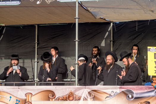 MERON, ISRAEL - MAY 03, 2018: Musicians play traditional songs for the dancing crowd, at the annual hillula of Rabbi Shimon Bar Yochai, in Meron, Israel, on Lag BaOmer Holiday