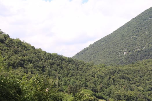 view of green mountains and blue clear sky