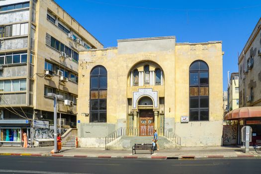TEL-AVIV, ISRAEL - AUGUST 31, 2016: Scene of Allenby street, with the Moshav Zekenim synagogue, local businesses, locals and visitors. In Tel-Aviv, Israel