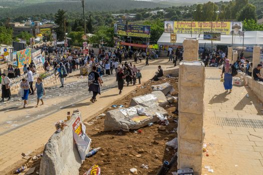 MERON, ISRAEL - MAY 03, 2018: Scene of Meron in the day of annual hillula of Rabbi Shimon Bar Yochai on Lag BaOmer Holiday, with participants. Northern Israel