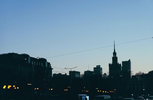 Cityscape silhouette of a European city as background, evening view of Warsaw, Poland