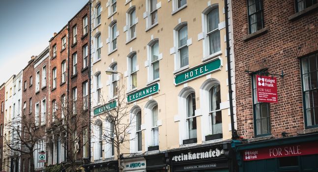 Dublin, Ireland - February 11, 2019: Architecture detail and street atmosphere in a shopping street on a winter day