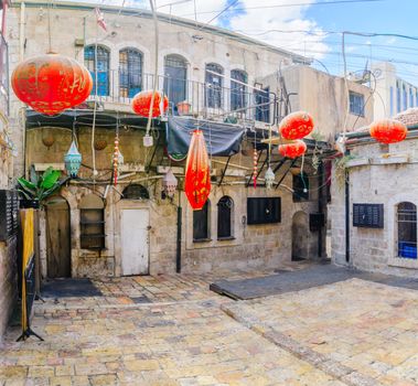 JERUSALEM, ISRAEL - SEPTEMBER 23, 2016: An inner yard with Chinese style decorations, in the historic Nachalat Shiva district, Jerusalem, Israel