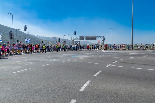 YAGUR, ISRAEL - MAY 05, 2018: Spectators wait for stage 2 of 2018 Giro d Italia, in Yagur, Israel