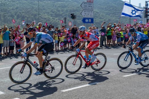 YAGUR, ISRAEL - MAY 05, 2018: Scene of stage 2 of 2018 Giro d Italia, with escape group cyclists and spectators, in Yagur, Israel