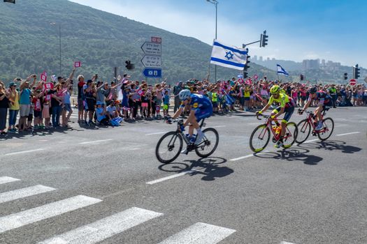 YAGUR, ISRAEL - MAY 05, 2018: Scene of stage 2 of 2018 Giro d Italia, with cyclists and spectators, in Yagur, Israel