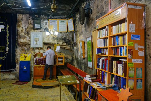 HAIFA, ISRAEL - SEPTEMBER 29, 2016: View of the Cave of Elijah, with prayers, in Haifa, Israel