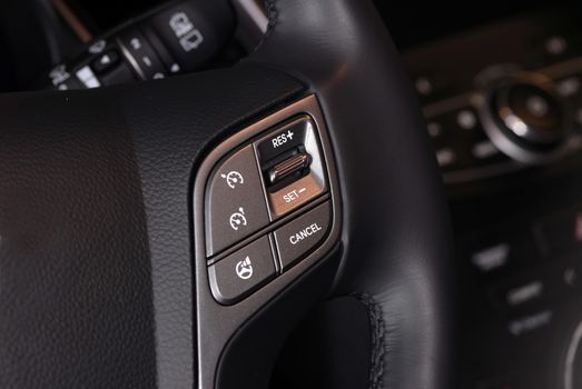 cruise control button which is located on the wheel