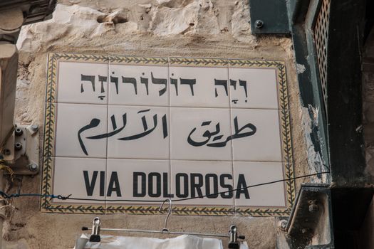 JERUSALEM - APRIL 18, 2014: Street sign - Via Dolorosa - in the old city of Jerusalem, Israel