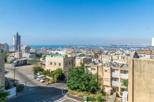 HAIFA, ISRAEL - JUNE 09, 2018: View of the downtown, and the port from Hadar HaCarmel neighborhood, Haifa, Israel