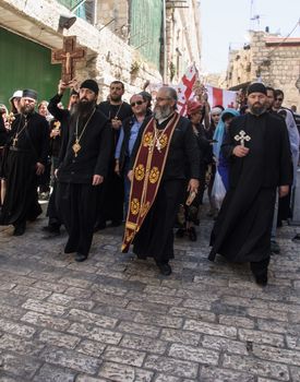 JERUSALEM - APRIL 18, 2014: The Jerusalem Greek Orthodox Patriarchate commemorating the crucifixion of Jesus Christ in via dolorosa, on good Friday, in the old city of Jerusalem, Israel