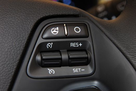 cruise control stick which is located on the wheel