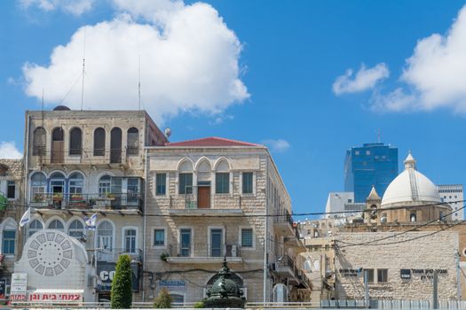 HAIFA, ISRAEL - JULY 21, 2018: View of Paris square, the Maronite church and other buildings, in Haifa, Israel