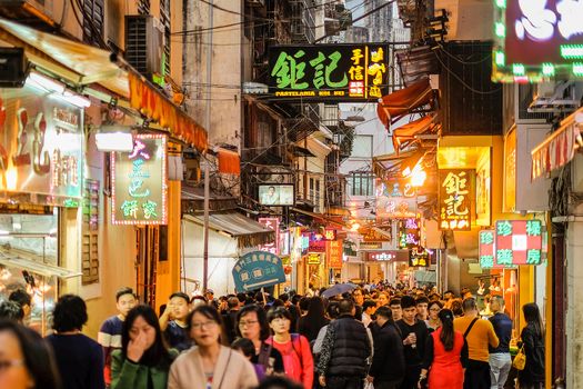 MACAU,CHINA January 11: Crowd people for tourism in Macau historic area of city in 11 January 2016