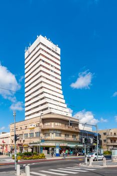 Haifa, Israel - May 13, 2014: View of mixture of old and new buildings, with locals and visitors, in Hadar HaCarmel neighborhood, Haifa, Israel