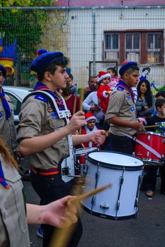 HAIFA, ISRAEL - DECEMBER 10, 2016: Scene of a Christmas parade, with local Arab Christians, and a crowd, as part of the holiday of holidays events, in Haifa, Israel