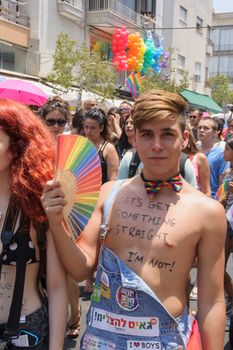 TEL-AVIV - JUNE 13, 2014: Participant of the Pride Parade in the streets of Tel-Aviv, Israel. The pride parade is an annual event of the gay community