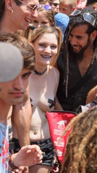 TEL-AVIV - JUNE 13, 2014: Participant of the Pride Parade in the streets of Tel-Aviv, Israel. The pride parade is an annual event of the gay community