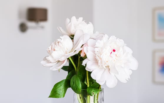 Chic bouquet of peony flowers in vase as home decor idea, luxury interior design and decoration concept