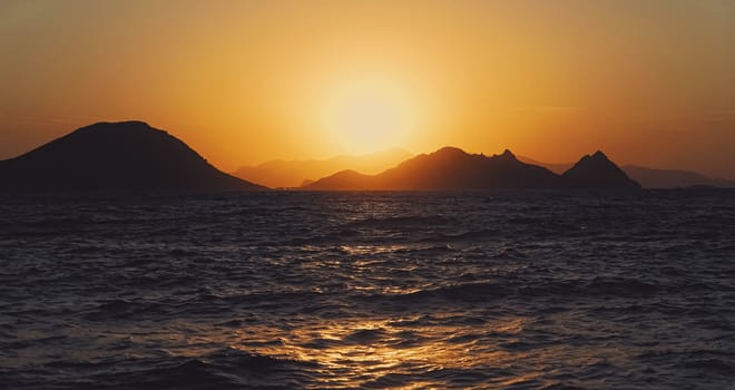 Beautiful sea view and mountains in the Mediterranean at sunset, summer vacation travel and holiday destination