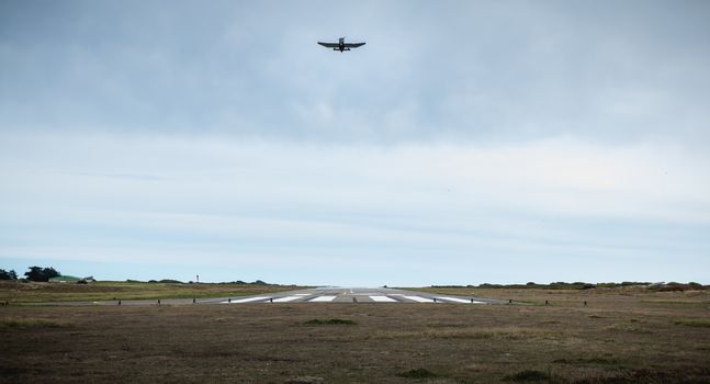 Port Joinville, France - September 16, 2018: Small passenger plane taking off from an airfield on Yeu Island near France on a fall day
