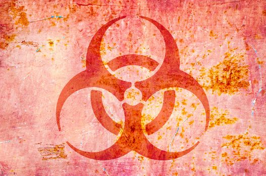 A biohazard symbol on an old wall