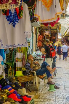 Jerusalem, Israel - October 19, 2018: Market scene in the old city, with locals and visitors, in Jerusalem, Israel